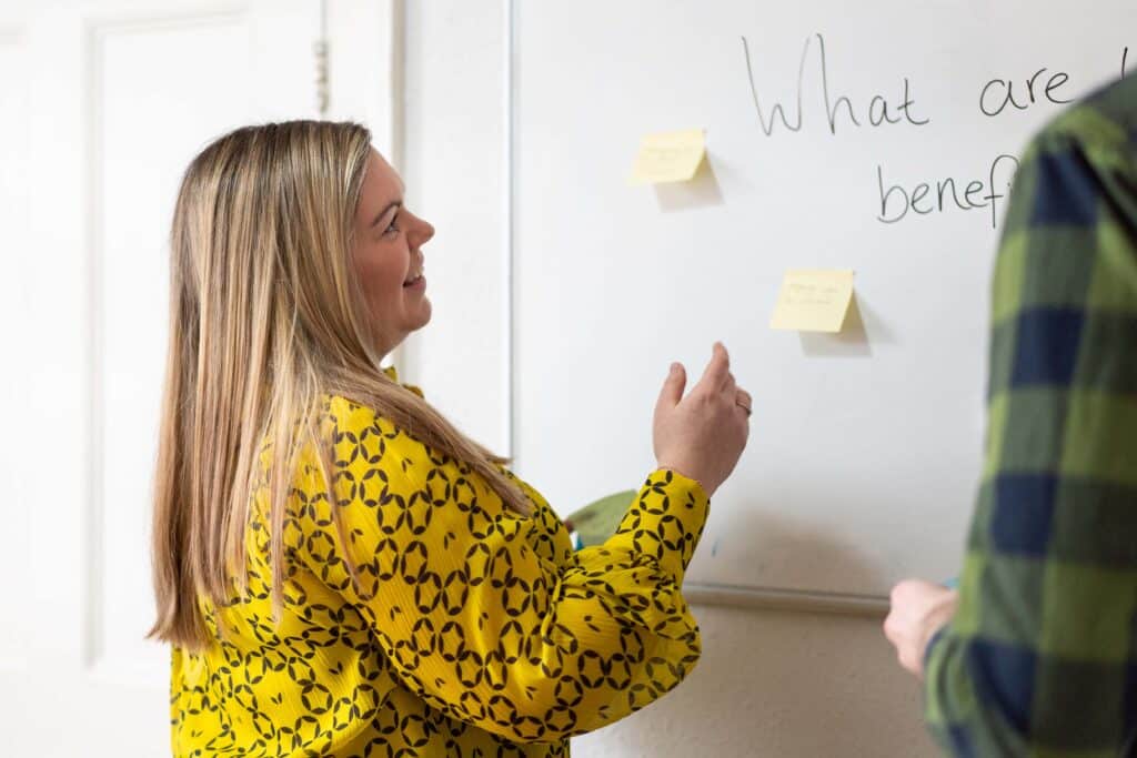 HR Training and Coaching HR training and coaching | Michelle Wall delivering a training session, presenting on a whiteboard at Red Kite HR Services.